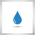 The droplet, a subtle shadow suggests depth against the plain Royalty Free Stock Photo