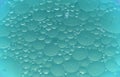 Background of water big and small drops. Smooth, reflection. Royalty Free Stock Photo