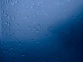 Blue water drops background selected focus Royalty Free Stock Photo