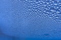 Blue water drops macro detail or close-up background Royalty Free Stock Photo