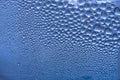 Blue water drops macro detail or close-up background Royalty Free Stock Photo