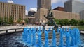 Blue water fountain with Runner Statue at Kiener Plaza Park in St. Louis - ST. LOUIS, UNITED STATES - JUNE 19, 2019