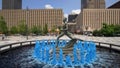 Blue water fountain with Runner Statue at Kiener Plaza Park in St. Louis - ST. LOUIS, UNITED STATES - JUNE 19, 2019 Royalty Free Stock Photo