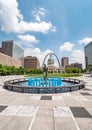 Blue water fountain with Runner Statue at Kiener Plaza Park in St. Louis - ST. LOUIS, USA - JUNE 19, 2019