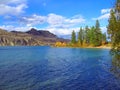 Blue Water and Golden Foliage in Fall at Juniper Bay Beach, Kalamalka Lake, Okanagan Valley, British Columbia, Canada Royalty Free Stock Photo