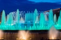 Blue water in Magic Fountain of Montjuic at night.