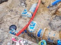 Blue water pipes and shut-off valve on pipe with branch Royalty Free Stock Photo