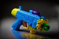 A blue water pistol to play with, generative ai Royalty Free Stock Photo