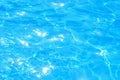 Blue water pool background texture abstraction solar bright light Royalty Free Stock Photo