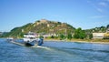 River barge on the Rhine River on it\'s approach to Ehrenbreitstein Fortress high above the town of Koblenz, Germany