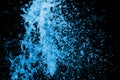 Blue water splash on the black background.  Close up Jet of water from hose use for abstract background Royalty Free Stock Photo