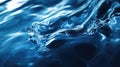 Blue water splashing creating dynamic abstract wave shapes Royalty Free Stock Photo