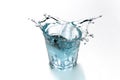 Blue water splashing in transparent glass. Refreshing drink
