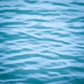 Blue water surface background texture blurred light with wave ri Royalty Free Stock Photo