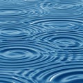 Blue water surface with concentric ripples spreading across it, creating a calming Royalty Free Stock Photo