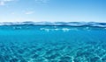 Blue water surface with ripples and waves. Underwater background. Royalty Free Stock Photo