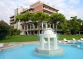 Blue water swimming pool at a hotel by the Saronic Gulf, Isthmia, Greece Royalty Free Stock Photo