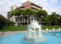 Blue water swimming pool at a hotel by the Saronic Gulf, Isthmia, Greece Royalty Free Stock Photo