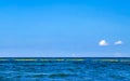 Blue water waves ocean with buoy buoys ropes nets Mexico