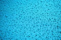 Blue waterproof material, rip stop cloth with drops of water Royalty Free Stock Photo