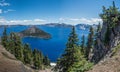 The blue waters of Crater Lake with Wizard Island Royalty Free Stock Photo