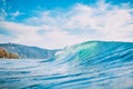 Blue wave in ocean. Barrel wave for surfing, sun light and shore