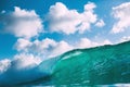 Blue wave in ocean. Breaking big wave and sky with clouds Royalty Free Stock Photo