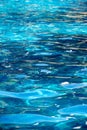Blue wave swimming pool and reflect light Royalty Free Stock Photo