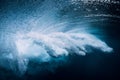 Blue wave underwater with air bubbles. Ocean in underwater Royalty Free Stock Photo