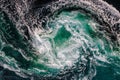 Blue waves of water of the river and the sea meet each other during high tide and low tide