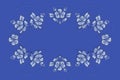 Blue wavy frame of beads and patterns of blue flowers and leaves for embroidery on tablecloth