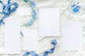 Blue wedding invitation set mockup decorated with silk ribbon, crystals and bride wreath Royalty Free Stock Photo