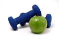Blue Weights and Green Apple Royalty Free Stock Photo
