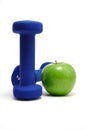 Blue Weights and Green Apple Royalty Free Stock Photo
