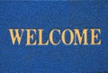 Blue welcome carpet, welcome doormat carpet Royalty Free Stock Photo