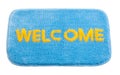 Blue welcome doormat Royalty Free Stock Photo