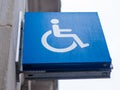 Blue Wheelchair access sign for disabled Royalty Free Stock Photo