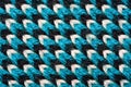 Blue, white and black pattern of synthetic knitted fabric texture Royalty Free Stock Photo