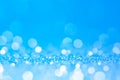 Blue and white bokeh,circle abstract light background,Blue shining lights,sparkling glittering Christmas lights.Blurred abstract e Royalty Free Stock Photo
