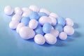 Blue and white candy dragees.