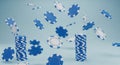 Blue and White Casino Poker Chips Falling and Stacked on a Light Blue Background Royalty Free Stock Photo