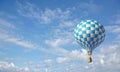 Blue-white checker hot air balloon Royalty Free Stock Photo