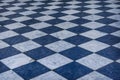 Blue and white checkered marble floor