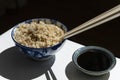 Blue and White Chinese Porcelain Flower Bowl Filled with Rice Royalty Free Stock Photo