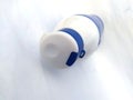 Blue and white cold water bottle isolated on white background Royalty Free Stock Photo