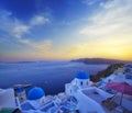 Blue and white colours of Oia City. Magnificent panorama of the island of Santorini Greece during a beautiful sunset in the Medite Royalty Free Stock Photo