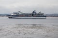 Blue and White Cruise Ship in Grey Water Royalty Free Stock Photo