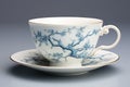 A blue and white cup and saucer on a saucer. Imaginary oriental pottery.