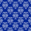 Blue and white damask ikat ornament geometric floral seamless pattern, vector