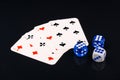 Blue and white dices and cards on black glossy background Royalty Free Stock Photo